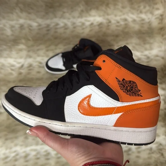 Air Jordan Black and Orange Sneakers
